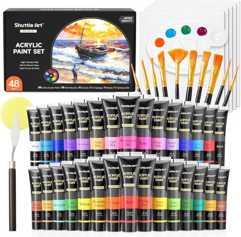 Palette d'artiste avec peinture acrylique en tube et pinceaux sur un fond de toile